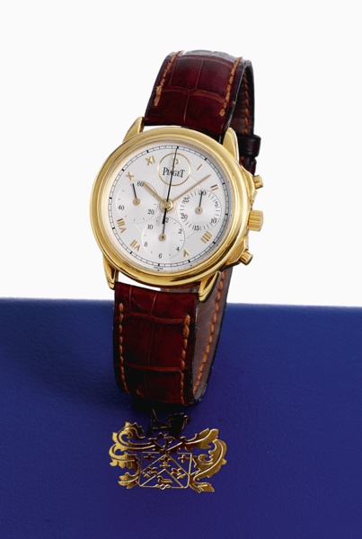 Piaget, Gouverneur, Chronograph, movement.No. 4410121, case No. 573534, Ref. 15978. Sold on.December 8th, 1993..Fine 18K yellow gold wristwatch with round button chronograph.registers with an 18K yellow gold Piaget buckle..Accompanied by fitted box, bookl