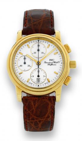 Ref. 3703 Yellow Gold Chronograph.International Watch Co., Schaffhausen, Chronograph, case No. 2539490, Ref. 3703. Made in the 1990's..Fine, 18K yellow gold wristwatch with date, square button chronograph, registers and an 18K yellow gold IWC buckle.