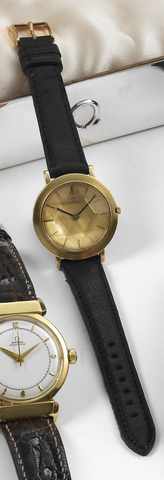 Omega Damier.Omega Damier, No. 16224680, Ref. 14741. Produced in the early 1960's..Very fine and unusual, flat, water-resistant, 18K yellow gold mid-size wristwatch with multi-faceted crystal. Accompanied by an.Omega sterling silver box..To be sold withou