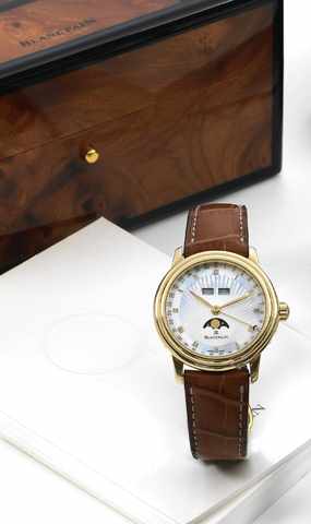 BLANCPAIN RENAISSANCE TRIPLE CALENDAR WITH MOON PHASES.Blancpain, Renaissance, Ref.3553-1418-A53, No. 79. Produced circa 2000..Very fine, self-winding, 18K yellow gold wristwatch triple calendar and moon phases, mother-of-pearl dial, hinged.case back, wit