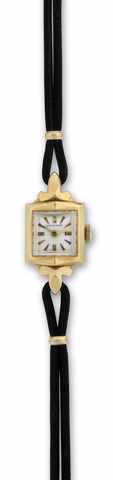 Yellow Gold Longines.Longines, No. 9998652, case No. 423257, Ref. 601. Made.in the late 1950's..Fine and small, square, 14K yellow gold lady