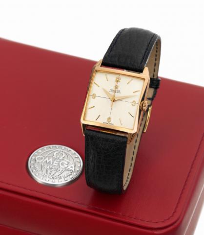 Omega Automatic.Omega, movement No. 16408612, Ref. OT 3985. Sold on.May 23,1961..Fine, square, center seconds, self-winding, anti-magnetic, 18K.pink gold wristwatch with a pink gold-plated Omega buckle..Accompanied by a certificate and a modern Omega box.