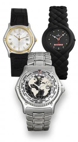 A lot of 3 Ebel watches.A/ Ebel, Voyager World Time, case.No. 34518999, Ref. E9124341. Made in.the late 1990's..Fine, tonneau-shaped, water resistant.self-winding, center-seconds, stainless.steel world-time wristwatch with date.and a stainless steel Ebel 