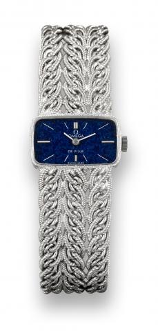 Omega De Ville, Movement.No. 32456952, case.No. 7117438, Ref. 1031 BC..Made in 1970..Fine and elegant, rectangular, 18K white.gold lady