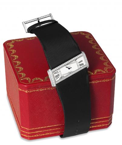 Cartier White Gold and Diamonds.Cartier, No. 2786, Ref. 20813CE. Sold on December 24, 1999..Very fine and extremely elegant, quartz, inclined rectangular, 18K white gold and diamond-set lady