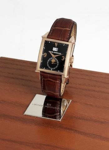 Girard-Perregaux Pink Gold.Big Date Moon-Phase.Girard-Perregaux, Big Date Moon-Phase, No. 39, Ref. 2580..Sold in 2002..Very fine and rare, square curved, self-winding, 18K pink gold.wristwatch with large date, moon phases, lunar calendar.and an 18K pink g