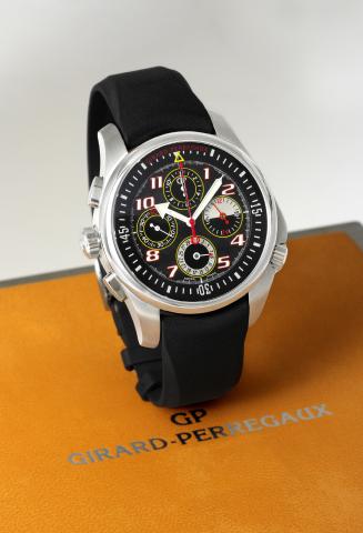 Girard-Perregaux Left-Handed Chronograph.Girard-Perregaux, Left Handed Chronograph, No. 062, Ref. 49930. Made circa 2004..Fine, self-winding, water-resistant, stainless steel wristwatch with oval button chronograph, register, central progressive 60-minute