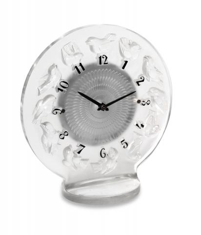 Omega Rossignol.Omega, movement No. 6770135, case number 7551097, Ref. 13.309, the case by R. Lalique. Movement and movement case sold.to Lalique in 1931..Exceptionally fine and rare, frosted glass and chrome 8-day going Art Deco mantel clock.