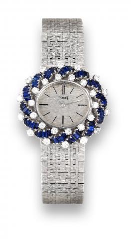 Piaget Diamonds.Sapphires.Piaget, movement No. 7612321, case.No. 233934, Ref. 9391 A6. Made circa.1970..Very fine and elegant, oval, 18K white.gold, diamond and sapphire lady's.wristwatch with an 18K white gold.integral Piaget bracelet.