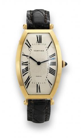 Cartier Tonneau Cintr_e.Cartier, Paris, Tonneau Cintr_e, No. A 107383, Ref. 106-91..Made circa 2000..Fine, tonneau-shaped, curved, 18K yellow gold wristwatch.