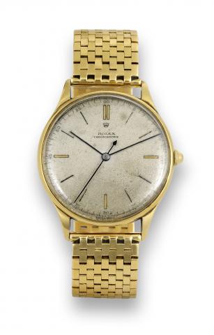 Rolex Yellow gold Ref. 4157.Rolex, Chronometre, case No. 165029, Ref. 4157. Made in.the 1940s..Fine and very rare, oversized, indirect center seconds, 18K.yellow gold chronometer wristwatch with Super Balance and.an 18K yellow gold tile link bracelet.