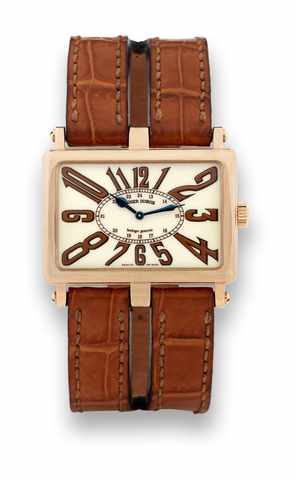 Roger Dubuis Pink Gold TooMuch.Roger Dubuis, Horloger Genevois, TooMuch.No. 05/28. Made in a limited edition of 28.pieces circa 2005..Fine and rare, horizontal rectangular and.curved, water-resistant, 18K pink gold.wristwatch with an 18K pink gold Roger.D