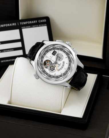 Zenith Grand Class Traveler - Multicity -.Steel Chronograph.Zenith, Open, Grand Class, El Primero, Automatic,.Ref. 03.0520.4037. Made circa 2006..Fine, large, two time zone, self-winding, water-resistant.stainless steel wristwatch with date, square-button