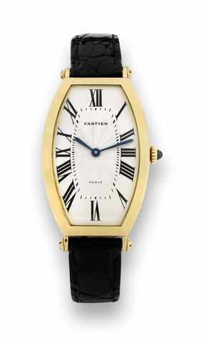 Cartier Tonneau Cintr_e.Cartier, Paris, Tonneau Cintr_e, No. A 103690, Ref. 106-91..Made circa 2000..Fine, tonneau-shaped, curved, 18K yellow gold wristwatch.