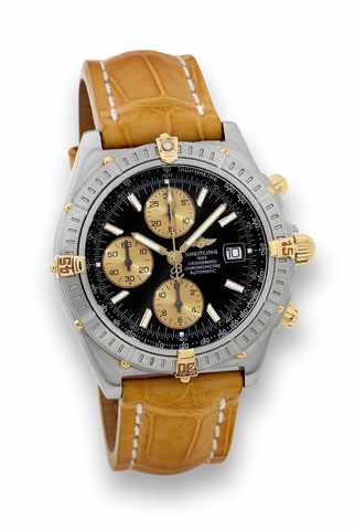 Breitling Crosswind, Chronometer Chronograph.Ref. A13355. Made in 2003..Very fine, self-winding, water-resistant, stainless steel and.18K yellow gold wristwatch with round button chronograph.registers, tachometer, date and a stainless steel Breitling.buck
