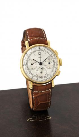 Jaeger, Chronograph, case.No. 89105. Made in the 1940s..Fine and rare, large, 18K yellow gold.wristwatch, with officer case and square.button chronograph, registers, telemeter.and tachometer with an 18K yellow gold.Jaeger LeCoultre buckle. Accompanied.by 