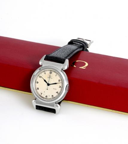 Omega Medicus.Omega, Medicus, movement No..8676981, case No. 9375711, Ref..CK2009. Made circa 1937..Fine and very rare, center seconds.Staybrite stainless steel wristwatch.with oversized claw lugs.