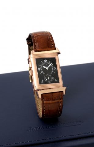 Jaeger-LeCoultre Night/Day pink gold.Jaeger-LeCoultre, Reverso - Duo Face Night-Day, case No..2220168, Ref. 272.240.543. Sold on April 25, 2005..Very fine, rectangular, two individually adjustable time zones.double dial, 18K pink gold reversible wristwatc