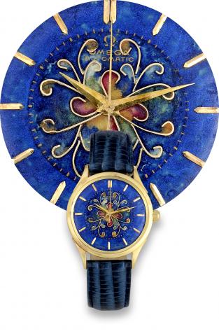 Omega Cloisonne Dial.Omega, movement No. 11690647, case No. 10886457.Ref. 2686. Made in 1950..Fine and extremely rare, center-seconds, self-winding, 18K.yellow gold wristwatch with cloisonn_ enamel dial and goldplated.Omega buckle. Accompanied by a modern