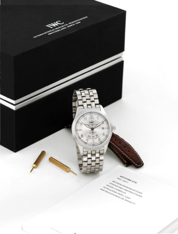 IWC Spitfire Universal Time Coordinated.International Watch Co., Schaffhausen, Die Fliegeruhr _ UTC.Automatic, case No. 3397189, Ref. 3251. Made circa 2007..Fine, two time zone, center seconds, self-winding, waterresistant.stainless steel wristwatch with 
