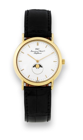 IWC Ref. 3852 - Quartz - Moon.International Watch Co., Schaffhausen, No. 2401468.case No. 2391279, Ref. 3852. Made in the 1990s..Fine and elegant, thin, 18K yellow gold quartz wristwatch.with moon phases and a gold-plated Wempe buckle..To be sold without 