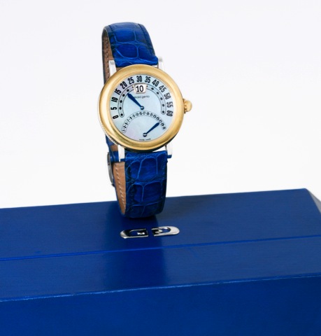 G_rald Genta Biretro.G_rald Genta, Biretro, case No. 90153, Ref. G 3734..Made circa 2000..Fine and unusual, jump-hour, self-winding, water-resistant.stainless steel and yellow gold wristwatch with retrograde.minutes, retrograde date and a stainless steel 