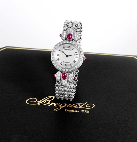 Breguet _ White Gold, Rubies & Diamonds _.Haute Joaillerie.Breguet, Classique Haute Joaillerie, No. 2954. Made circa.2000..Extremly fine and elegant, 18K white gold, diamond and.ruby-set lady's wristwatch with an integral 18K white gold.Breguet chain brac