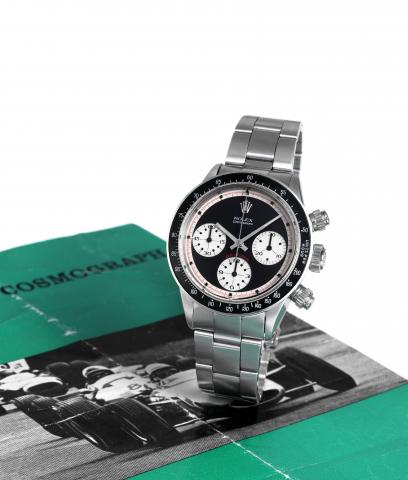 Rolex, Ref. 6240 Paul Newman, Non Oyster Dial.Rolex, Cosmograph, Daytona, case No. 1659454, Ref. 6240. Made circa 1967..Very fine and extremely rare, water-resistant, stainless steel wristwatch with round button chronograph, registers, tachometer.anti-ref