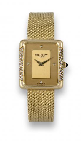 Patek Philippe Ref. 4311, Yellow Gold and.Diamonds.Patek Philippe, Geneve, movement No. 1395152, case.No. 2778098, Ref. 4311. Made in the 1980s..Very fine and elegant, rectangular, 18K yellow gold and.diamond lady