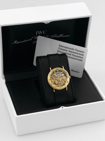 IWC Skeleton Portofino.International Watch Co., Schaffhausen, Portofino.movement No. 2480313, case No. 2709099, Ref. 2701. Made.in the 1990s..Very fine and elegant, thin, skeletonized, self-winding, 18K.yellow gold wristwatch with an 18K yellow gold IWC b