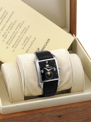 Girard Perregaux White Gold.Vintage 1945 Large Date No. 1.Girard Perregaux, Vintage 1945, No. 01.Ref. 2580. Made in the 2000s..Very fine, rectangular curved, self-winding.water-resistant, 18K white gold wristwatch.with large, ages and phases of the moon a