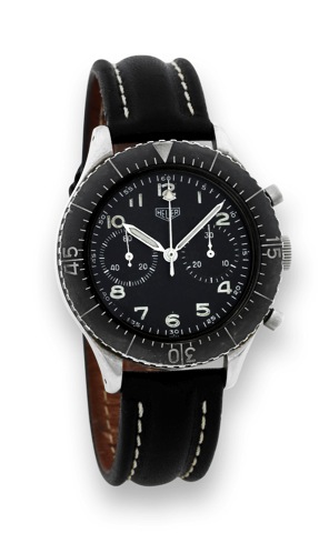 Heuer Flyback Chronograph.Heuer, Flyback Chronograph. Made in circa 1966..Fine, water-resistant, stainless steel wristwatch with black.bezel, round button Flyback chronograph and register..To be sold without reserve