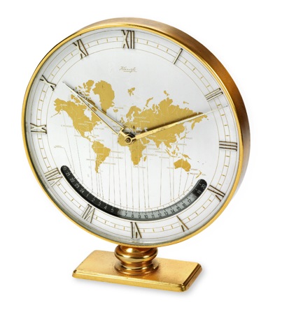 Kienzle World Time Clock.Kienzle. Made circa 1960..Large world time, 8-day going desk clock with 24-hour day.and night indication.To be sold without reserve