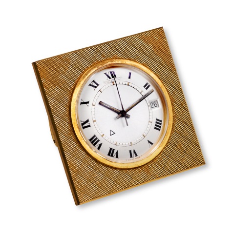 Jaeger-LeCoultre Memovox.Jaeger-LeCoultre, Swiss, Memovox, No. 1054149. Made.in the 1960s..Fine, center-seconds, gilt brass travel pocket watch with.alarm, date and 2 crowns. Accompanied by the original fitted.leather pouch..To be sold without reserve