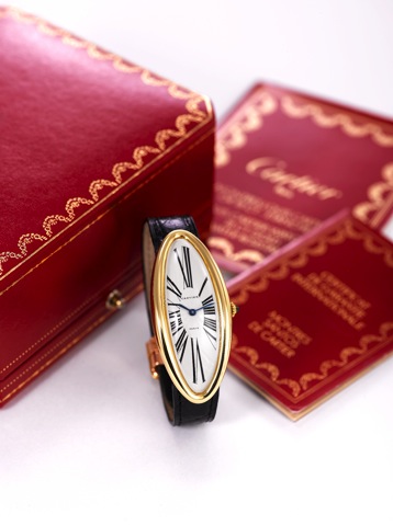 CARTIER BAIGNOIRE ALLONGEE.Cartier, Paris, Baignoire Allong_e, case No. A 108238.Ref. 242-91. Made in 1994, sold December 10th, 1995..Very fine and unusual, oversized, oval, curved 18K yellow.gold wristwatch with an 18K pink gold Cartier deployant.clasp. 