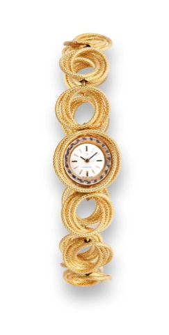 Interlaced Circles.Omega, No. 23209941, case No. 59338, Ref. 7183. Made in.the 1960s..Fine and elegant, 18K yellow gold lady