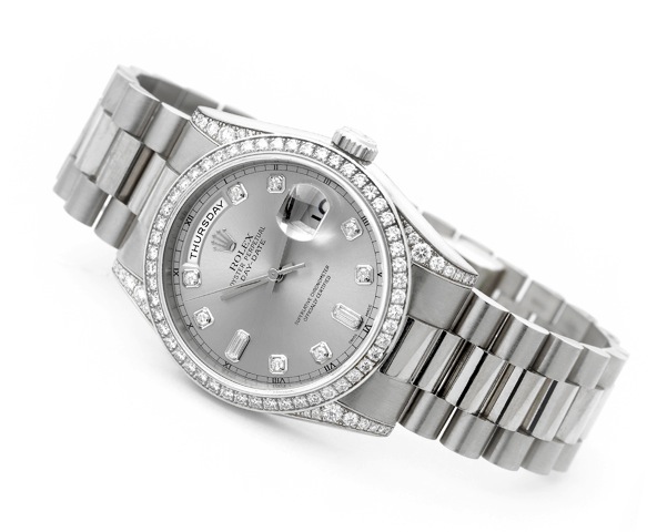 Rolex - White Gold & Diamond - Day-Date.Rolex, Oyster Perpetual Day-Date, Superlative Chronometer Officially Certified, case No. K 591148.Ref. 118389. Made in 2001..Very fine, center seconds, self-winding, water-resistant, 18K white gold wristwatch with d