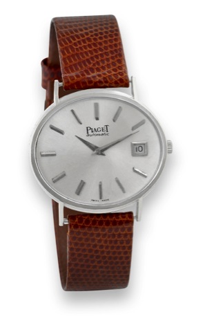 Piaget - Horizontal Oval - White Gold.Piaget, Automatic, movement No. 741869, case No. 242111.Ref. 13501. Made in the 1970s..Fine and elegant, horizontal oval, 18K white gold wristwatch.with date and an 18K white gold Piaget buckle.