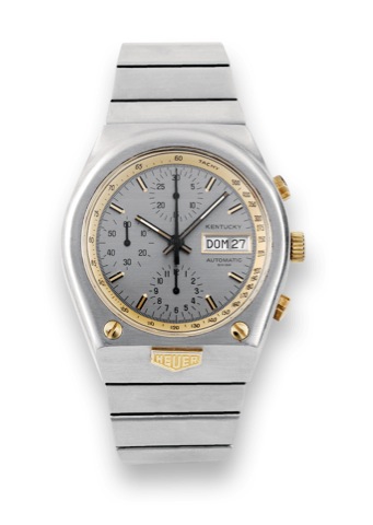 Heuer, Kentucky, Automatic, case No. 372827.Ref. 750.705. Made circa 1977..Fine, tonneau shaped, water resistant, self-winding, stainless.steel and yellow gold wristwatch, round button chronograph.registers, day/date, tachometer and a stainless steel Heue