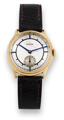 Rolex Ref. 1184 Two-Tone Sector Dial.Rolex, Ref. 1184, case No. 61452. The case with Dublin.import marks for 1929..Fine and very rare, early, 18K yellow gold, water-resistant.wristwatch with double screw-down case, two-tone sector.dial and Extra Prima mov