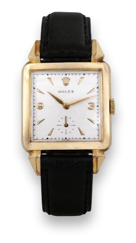 Rolex, Square, case No. 875023, Ref. 8813. Made in.the 1940s..Fine, square, gold filled wristwatch with a gold-plated.Rolex buckle..To be sold without reserve