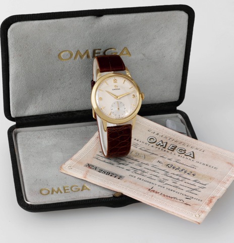 Omega, movement No. 13478424.case No. 11267520, Ref. 2684. Made in 1952..Fine, 14K yellow gold wristwatch with a gold plated Omega.buckle. Accompanied by the original box and guarantee.