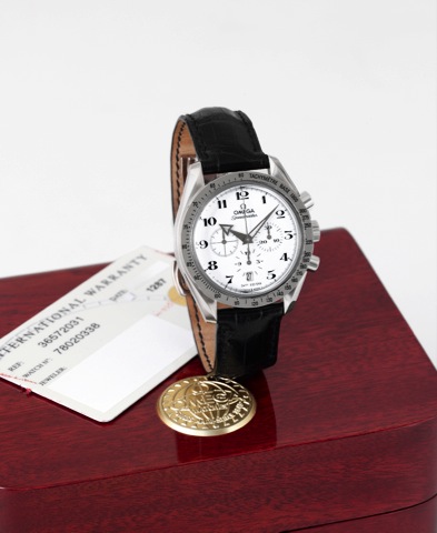 Omega Speedmaster - White Gold.Broad Arrow Enamel Dial.Omega, Speedmaster, No. 12/99, movement and case.No. 78020338, Ref. 36572031. Made in a limited edition.of 99 pieces, in 2001..Fine and rare, water-resistant, self-winding, 18K white gold.chronometer 