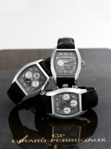 Girard-Perregaux, Richeville Collection Complication Set, Made.circa 2000..Extremely fine set of three, large, rectangular curved, selfwinding.water-resistant, platinum wristwatches. Accompanied by.the special Girard-Perregaux fitted box for the three wat