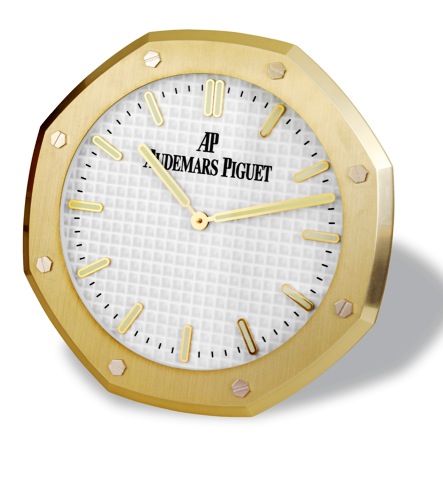 Audemars Piguet Royal Oak Wall Clock.Audemars Piguet, Royal Oak. Made in the 1990s..Fine pink-gilt stainless steel wall clock with quartz movement..To be sold without reserve