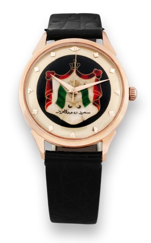 Eska Watch Co. -.Cloisonne Dial.Saudi Arabia.Pink Gold Eska Watch Co., Swiss.Automatic, case No. 144395. Made in.the 1950s..Fine and rare, center seconds, selfwinding.water-resistant, 18K pink gold.wristwatch with cloisonn_ enamel dial.depicting the Saudi