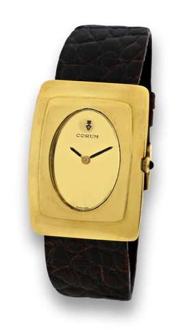 CORUM - YELLOW GOLD.Corum, movement No. 82183, case No. 102496.Ref. 57156. Made in the 1980's..Fine, rectangular, 18K yellow gold wristwatch with a goldfilled.Corum buckle.