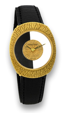 Jaeger LeCoult re - Mystery _ Back-Winder.Jaeger-LeCoultre, No. 1279224, Ref. 17007. Made in.the 1970's..Fine and unusual, tonneau-shaped, 18K yellow gold wristwatch.with back winder..To be sold without reserve