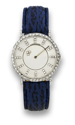 Longines Mysterious White Gold.Diamonds.Longines, cased by Longines-Wittnauer Watch Co., New.York-Montreal, movement No. 50755291, Ref. 167 B-528..Made in the 1950's..Fine and unusual, 18K white gold and diamond wristwatch.