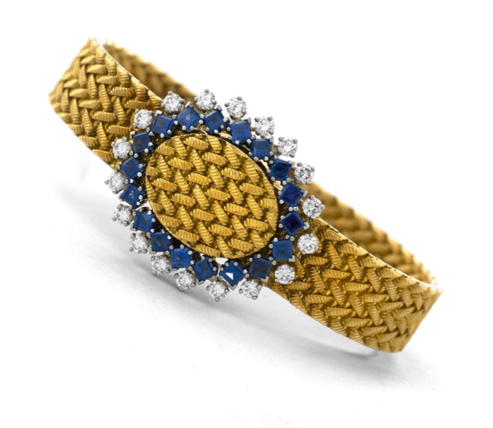 Piaget Diamonds & Sapphires.Piaget, Ref.3770 D3, case No. 191927. Made in the 1970's..Very fine and rare 18K yellow gold lady's wristwatch with diamond and.sapphire-set bezel,18K yellow gold Piaget bracelet and sprung cover.